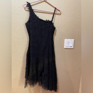 Guess black star and sequin asymmetrical little black dress.  Size 6.